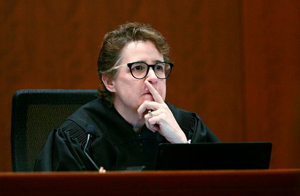 Judge Penney Azcarate listens in the courtroom at the Fairfax County Circuit Courthouse in Fairfax, Va., Tuesday, May 17, 2022. Actor Johnny Depp sued his ex-wife Amber Heard for libel in Fairfax County Circuit Court after she wrote an op-ed piece in The Washington Post in 2018 referring to herself as a "public figure representing domestic abuse."