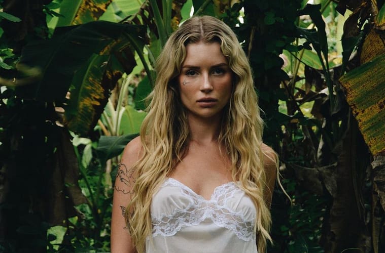 lottie moss face tattoo