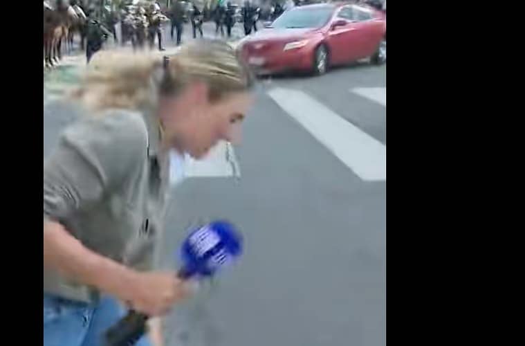 9News Reporter Hit by Rubber Bullet Video