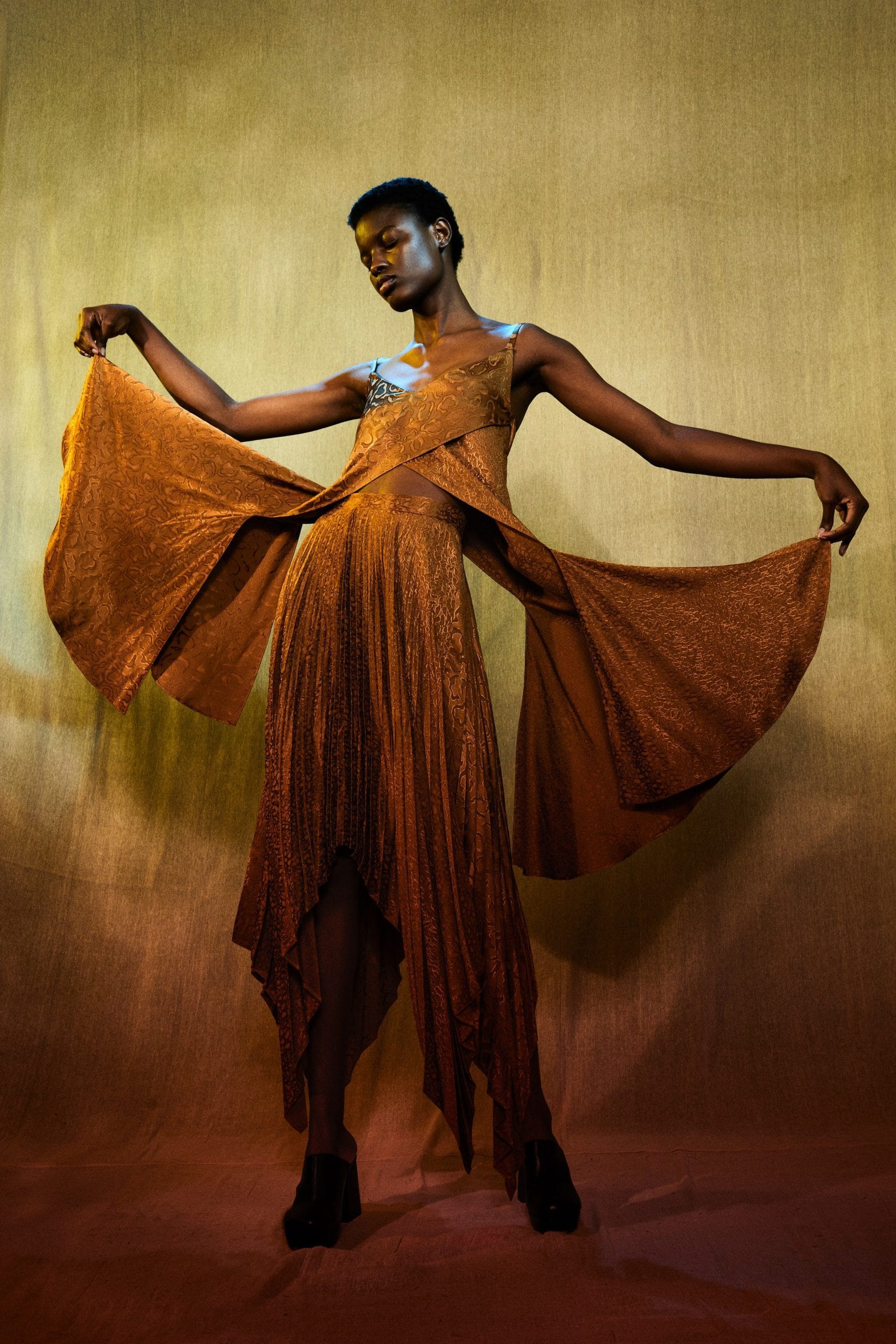 A model wears look 27 from Edeline Lee's A/W 2022 collection