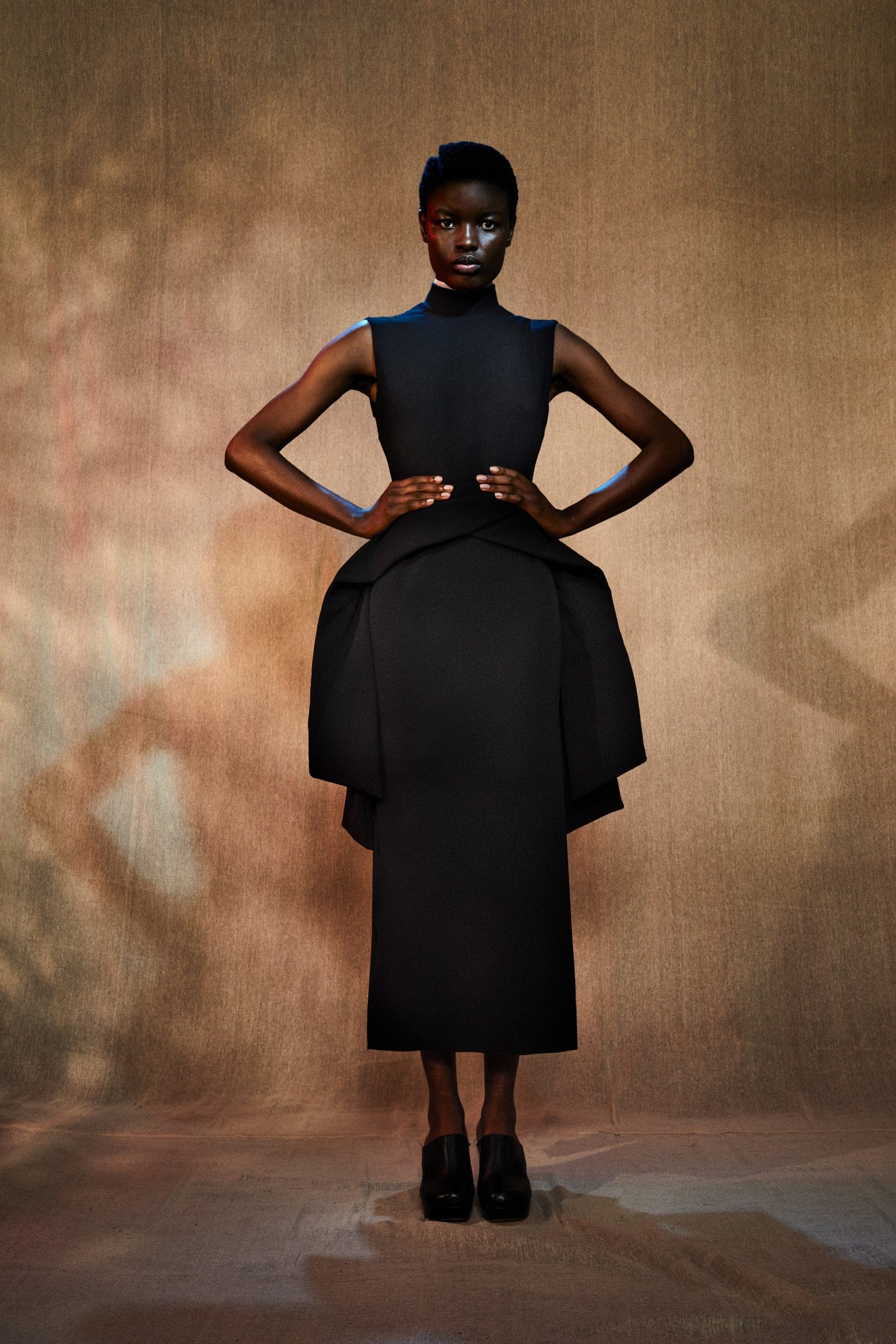 A model wears look 1 from Edeline Lee's A/W 2022 collection