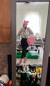 Cardi B wearing designer clothes while completing community service.