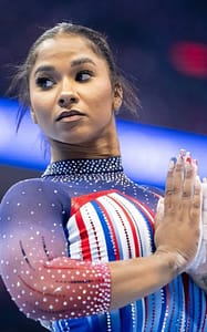 Rapper Flavor Flav Creates Bronze Medal for Gymnast Jordan Chiles