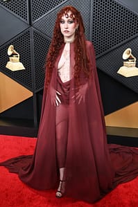 Chappell Roan posing in an avant-garde Mugler ensemble on the Grammys red carpet.