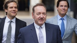 Kevin Spacey (middle) walking into court with his legal team (right and left)