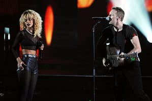 Rihanna rocking blonde hair singing with Chris Martin