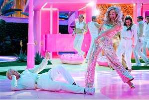 Barbie (right) and Ken (left) dancing at a party at Barbie's Dream house