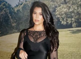 Kourtney Kardashian Wows in Sheer Lace Mini Dress