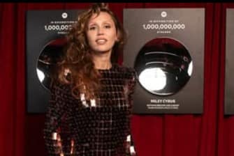 Miley Cyrus Dazzles in Blue at Spotify’s Billions Club Paris