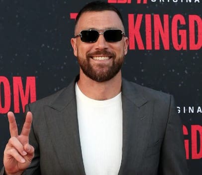 Travis Kelce Suits Up with Shades for The Kingdom Red Carpet Premiere