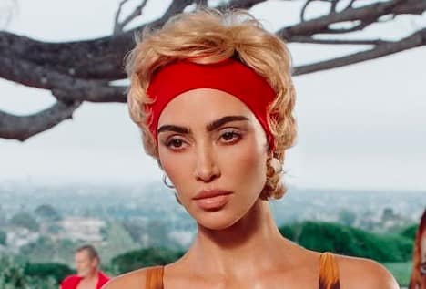 Kim Kardashian Debuts Curly Blonde Bombshell Look