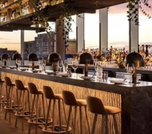 the bar of the rooftop patio at harriets toronto
