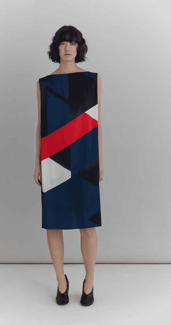 Model wearing squared geometic dress