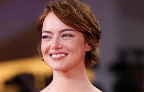 Emma Stone Dazzles Venice with Alien Kidnap Drama