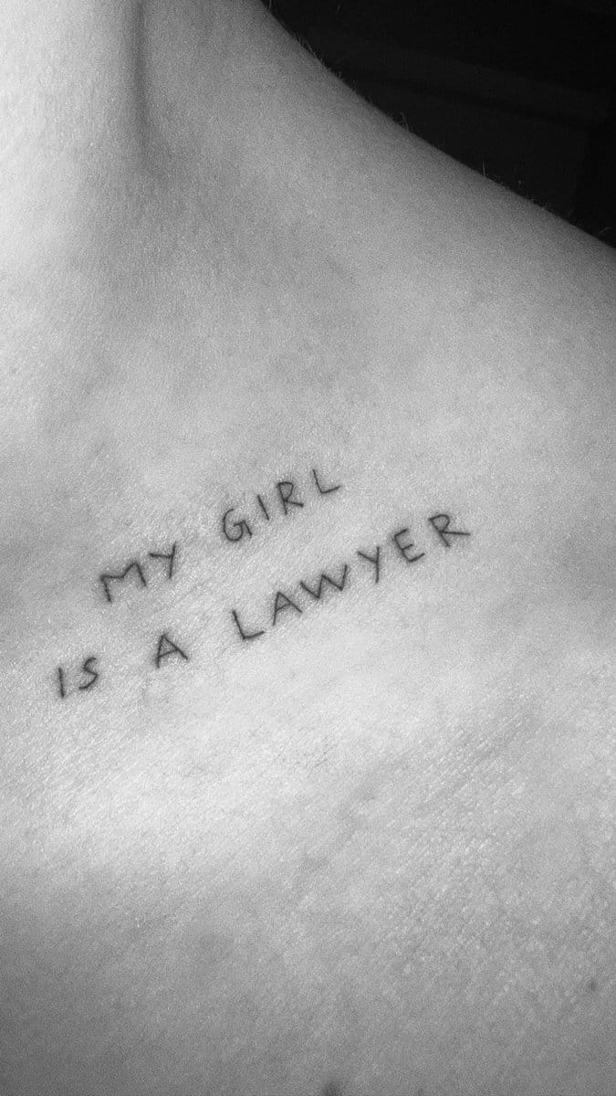 "My girl is a lawyer" tattoo on Pete.