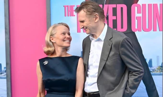 Pamela Anderson & Liam Neeson Spark Romance: "It’s Clear They’re Smitten"