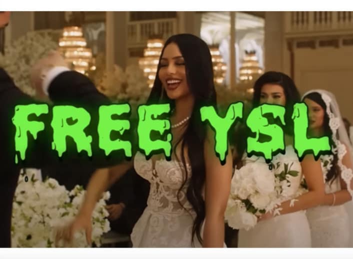 "FREE YSL" in bold green slime font