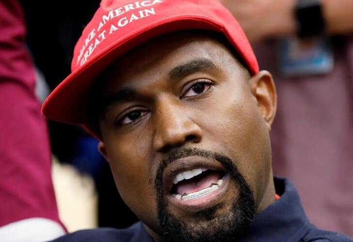 kanye west in MAGA hat