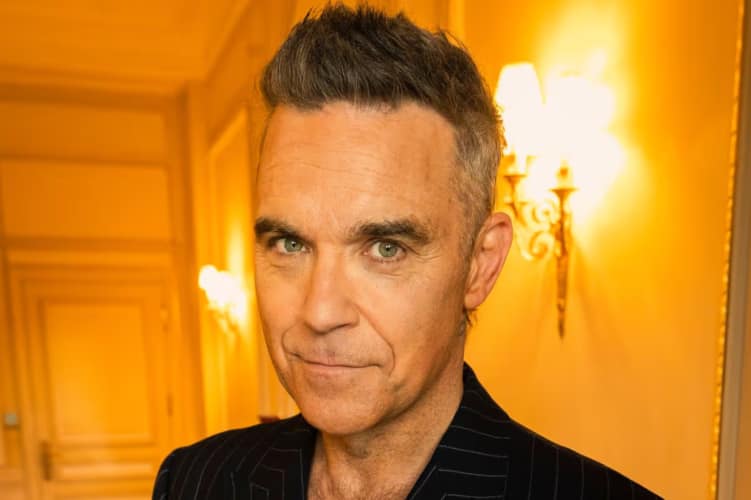 Robbie Williams breaks Beatles’ UK No. 1 albums record