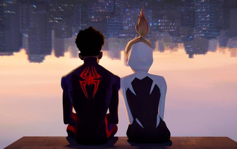Miles Morales and Spider-Gwen(Stacy) sitting upside down, in their super suits, overlooking NYC
