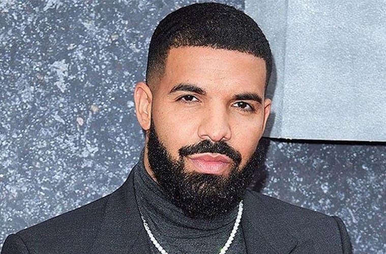 Drake smiling at camera