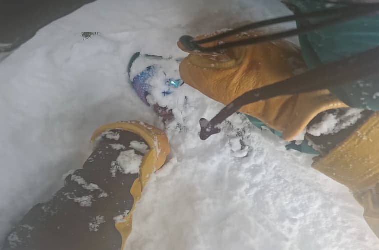 skier saves snowboarder video