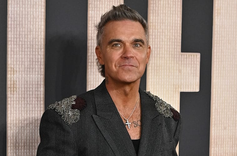 Robbie Williams Apologizes for Madonna Age Jibe