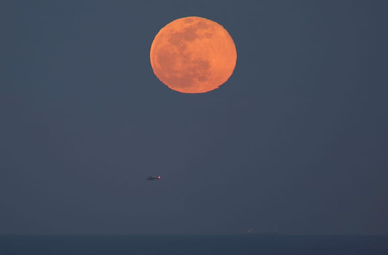 Why is the moon orange tonight 2025