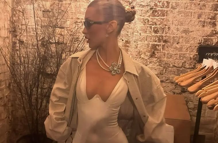 Bella Hadid Wows in Plunging Silk Dress and Jewels in Stunning New Snapshots: ‘Oh Baby’