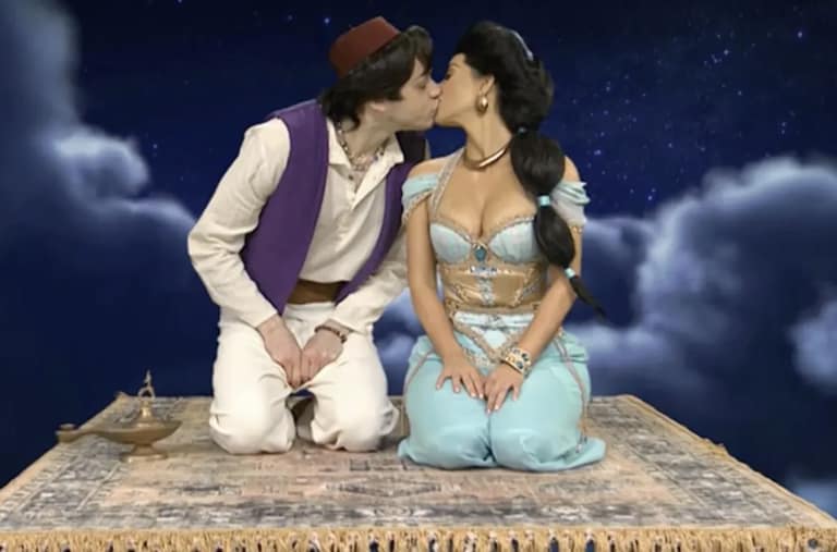 Kim and Pete lock lips.