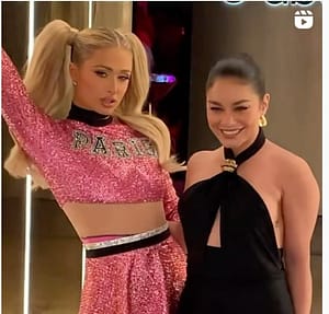 Paris Hilton in glittering pink miniskirt and Vanessa Hudgens in black dress